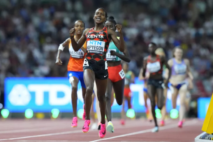 Faith Kipyegon pushes pace and pulls away to defend 1,500-meter title at world championships