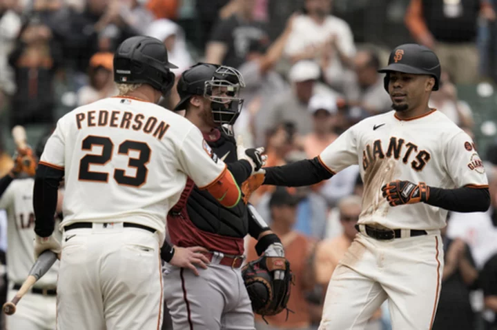 Wade provides only run with a homer in the 4th as Giants blank Diamondbacks 1-0