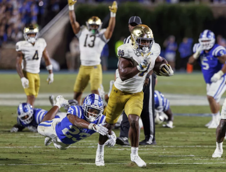 Estime and Hartman help No. 11 Notre Dame push past No. 17 Duke for 21-14 road win