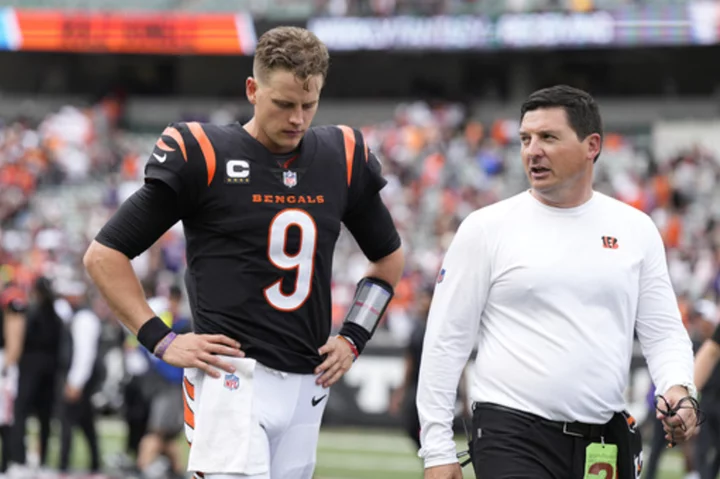 Joe Burrow is still day to day with lingering effects of calf injury, says Bengals coach Zac Taylor