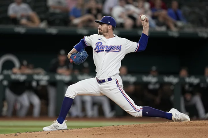 Heaney strikes out 11, Garver and Garcia homer as Rangers beat White Sox 2-0 in less than 2 hours