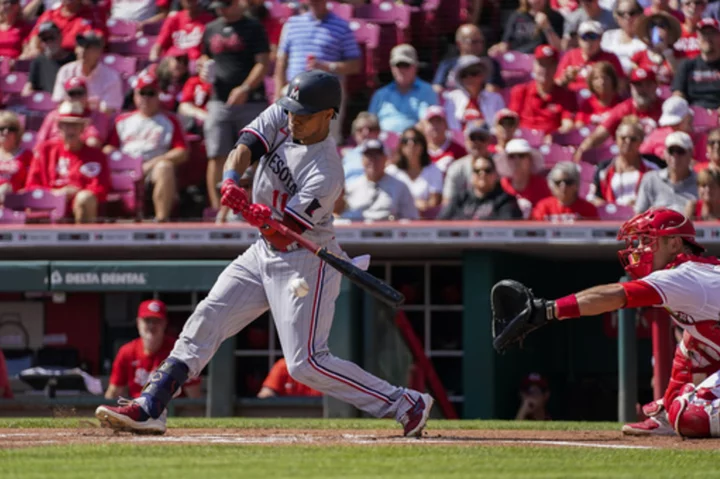 Twins overcome Hunter Greene's 14 Ks, rally to beat Reds 5-3 and drop AL Central magic number to 1