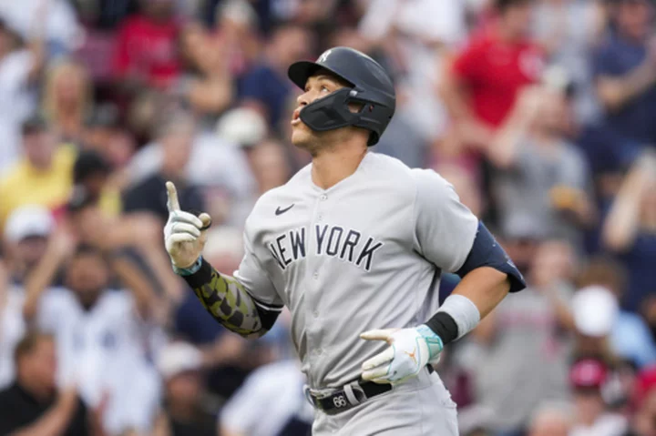 Judge homers again, powers Yankees past Reds 6-2