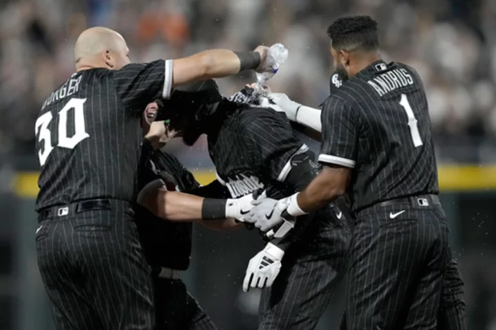 Luis Robert Jr. hits RBI single in 9th to give White Sox 2-1 win over Marlins