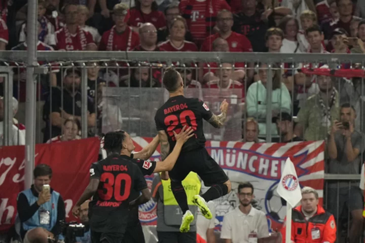 Leverkusen strikes late to hold Bayern 2-2 in Munich to declare itself a Bundesliga title contender