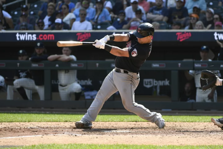 Guardians rally for a 5-2 win on Calhoun's 3-run homer in the 10th and cut Twins' lead to 5 games