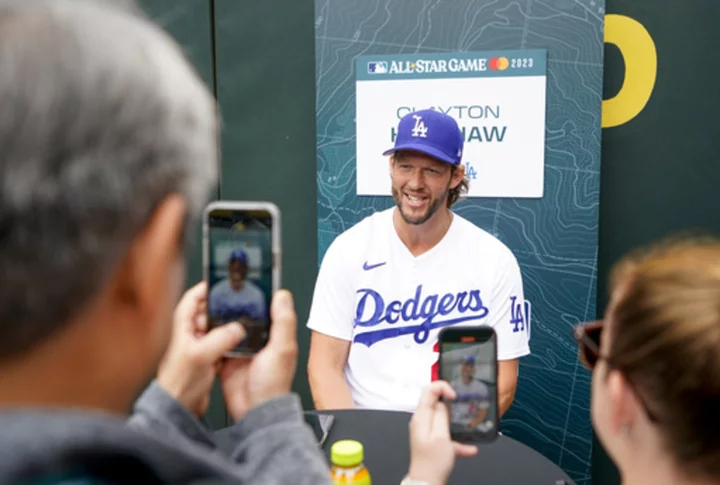 Clayton Kershaw throws a bullpen session as he works toward return from sore shoulder