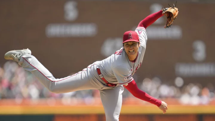 Ohtani throws first MLB shutout in Angels' 6-0 win over Tigers after team says he's staying