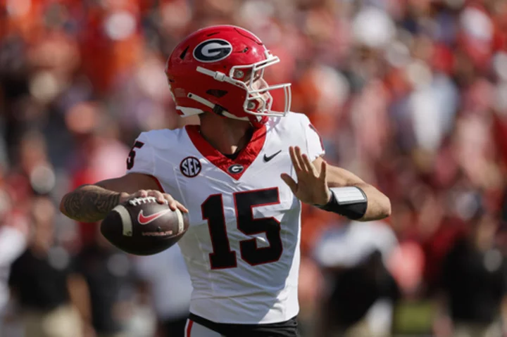 Beck-to-Bowers combo rallies No. 1 Georgia to 27-20 win over Auburn