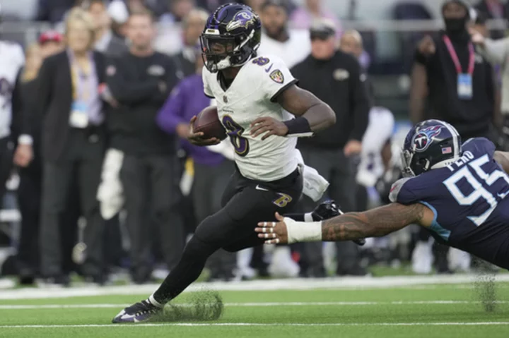 Jackson throws TD pass and Tucker kicks 6 FGs for Ravens in 24-16 win over Titans in London