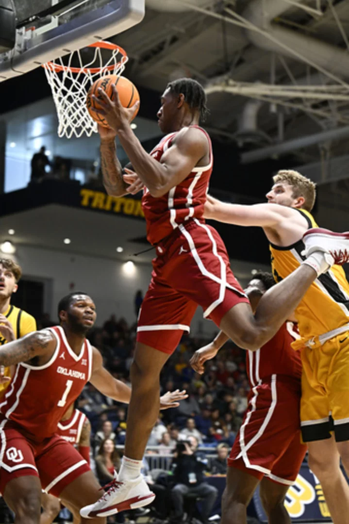 Jalon Moore scores 18 to help Oklahoma beat Iowa 79-67 at Raby Children's Invitational