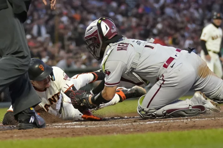 Davis hits tiebreaking double in 6th to back Webb's first win in 5 starts, Giants beat D-backs 4-2