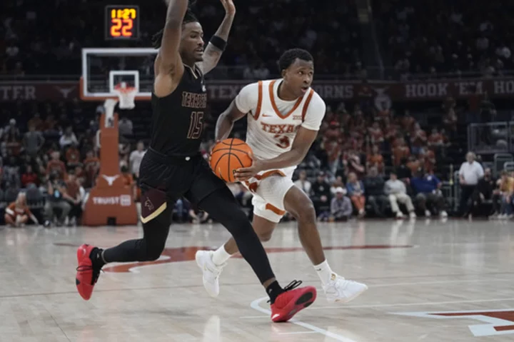 Abmas scored season-best 26 to lead No. 16 Texas past Texas State 77-58