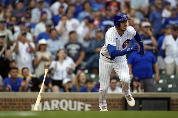 Cody Bellinger drives in 4 runs as the Cubs top the Cardinals 8-6 on a rainy day at Wrigley