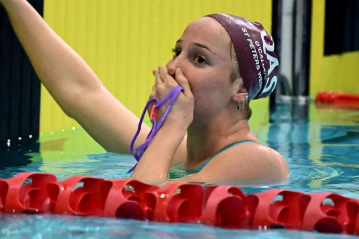 O'Callaghan edges McKeon to win 100m free in year's fastest time