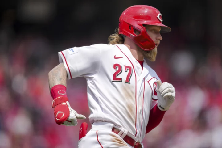 Fraley's homer sends the Reds to their 11th straight win, their longest streak in 66 years