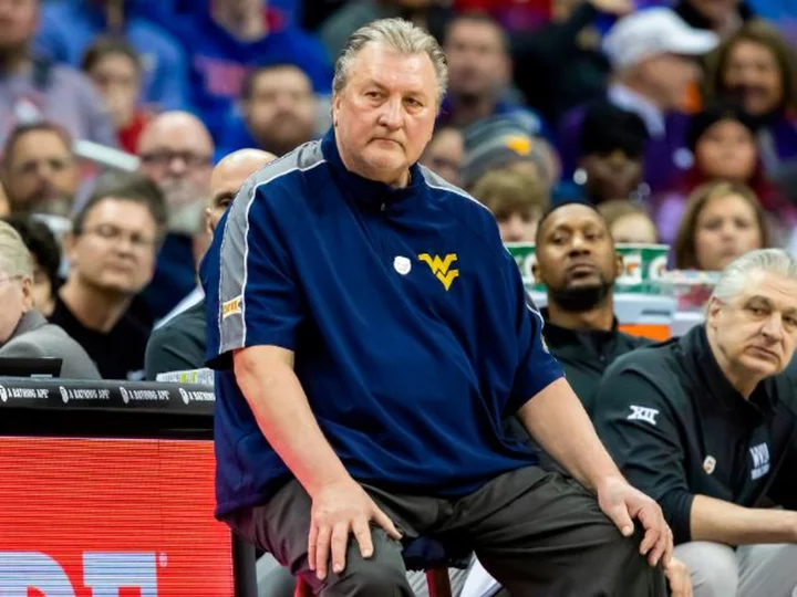 West Virginia's men's basketball head coach apologizes for 'insensitive and abhorrent' comments made on radio interview