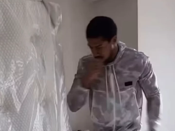 Tyson Fury reacts to footage of Anthony Joshua using mattress as heavy bag