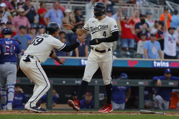 Rangers drop from AL West lead as Twins win 7-6 in 13 innings, overcoming 5-run deficit