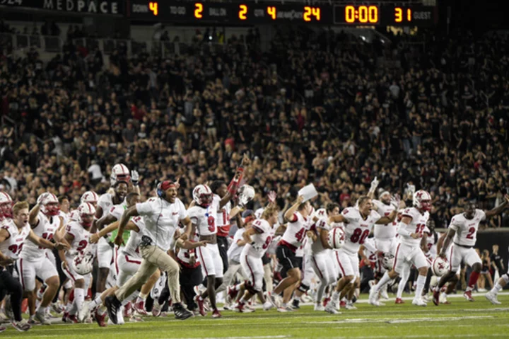 Miami of Ohio defeats Cincinnati 31-24 in OT, breaking a 16-game losing streak in the series