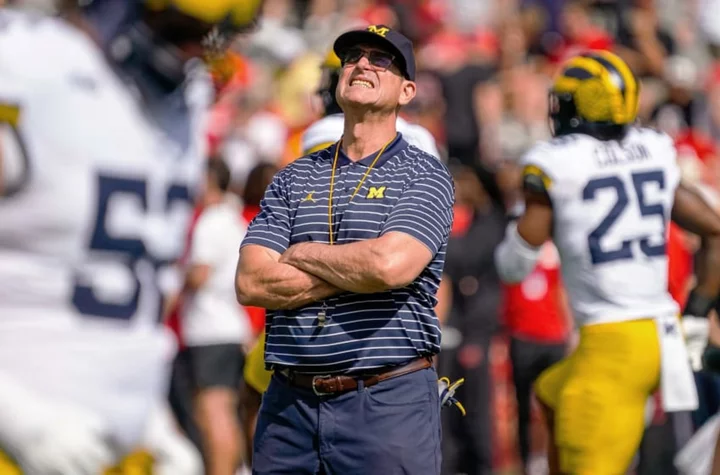 College Football Playoff committee will consider Jim Harbaugh’s absence in any Michigan loss