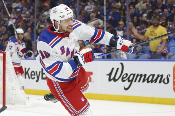 Kreider scores twice in Rangers' season-opening 5-1 win over Sabres