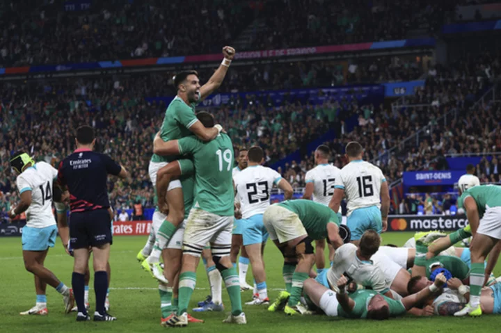 Ireland edges South Africa in Rugby World Cup clash of titans. England romp and Portugal draw