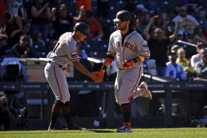 Giants stop slide, beat Rockies 11-10 to stop slid