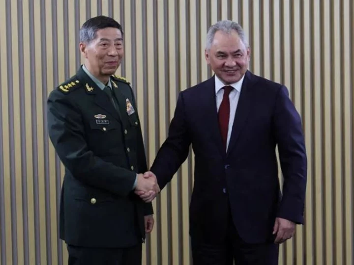 China's defense minister warns against 'playing with fire' on Taiwan during Russia meeting