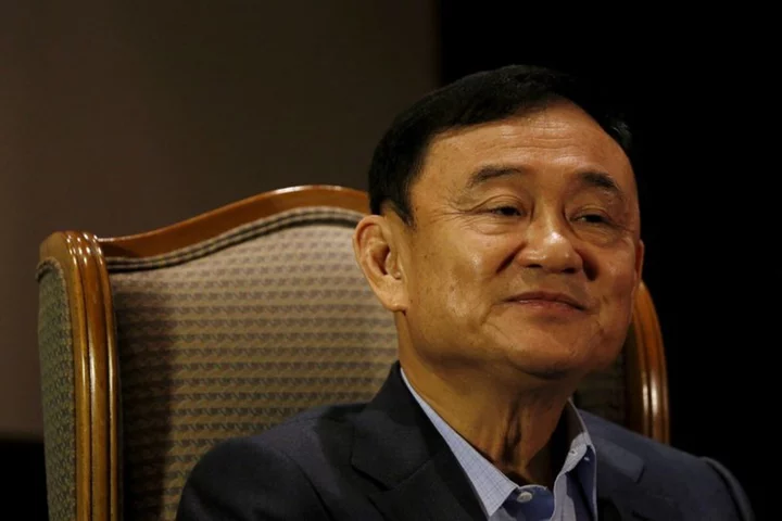 Thai ex-PM Thaksin says postponing return from self-exile