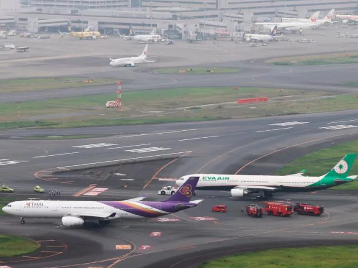 Two planes 'likely collided' at airport in Tokyo