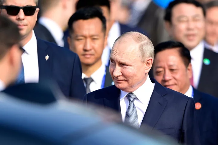 Putin arrives in China on rare trip abroad to meet ‘dear friend’ Xi Jinping